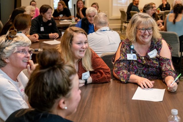 Team members and residents play a game together at Bridgewater Retirement Community
